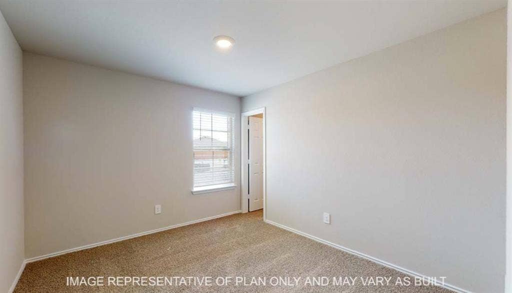 10412 Altair Drive, Waco, TX 76708 Neutral wall paint, plush carpeting, recessed ceiling light, and a window with blinds