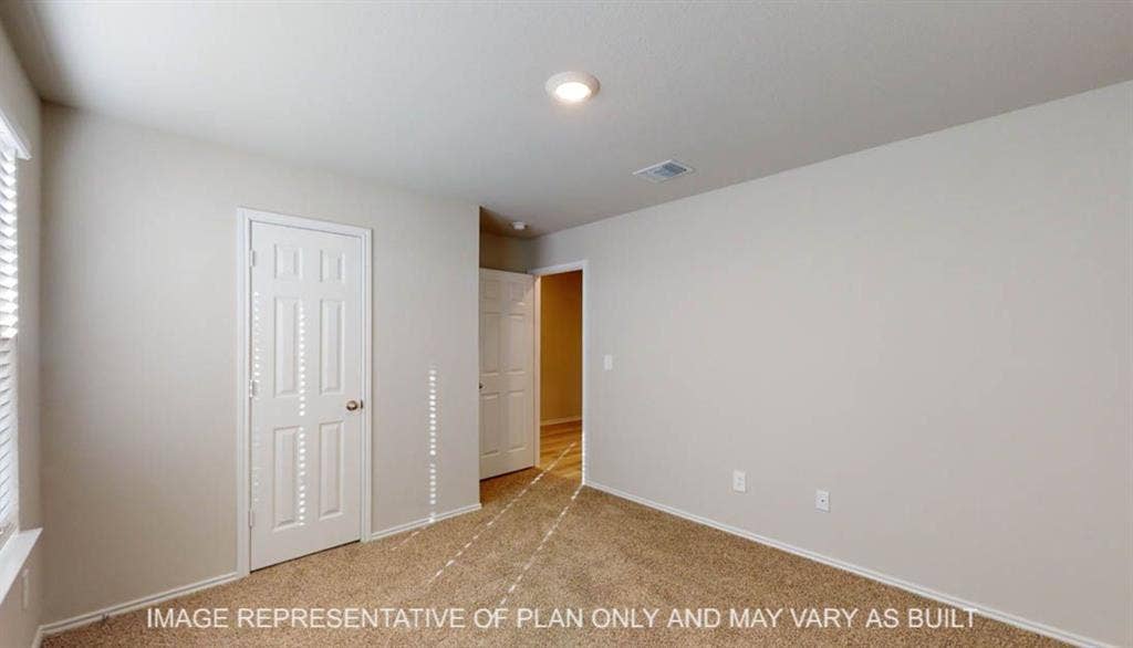 10405 Altair Drive, Waco, TX 76708 Neutral wall paint, carpet flooring, a single window with blinds, and recessed lighting