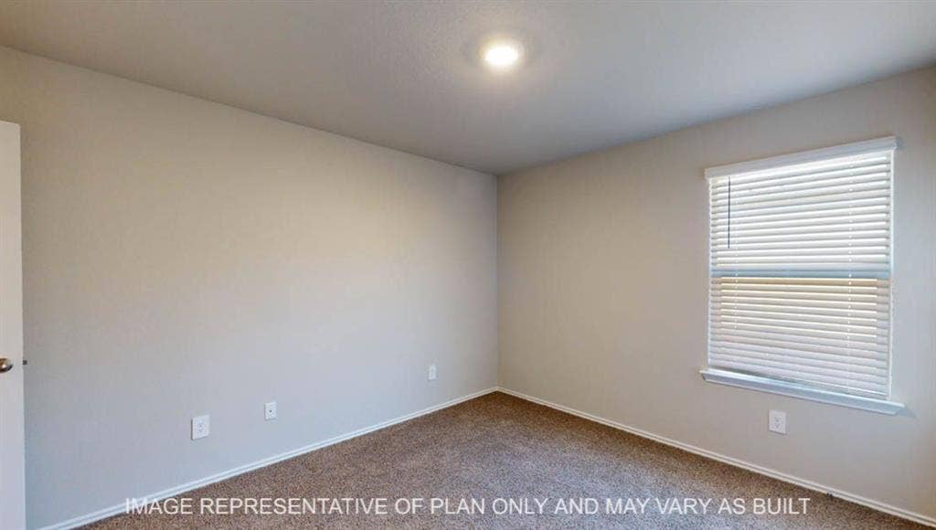 10405 Altair Drive, Waco, TX 76708 Neutral wall paint, recessed ceiling lighting, textured carpet flooring, and a single window with blinds