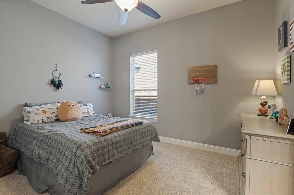 1504 Daisy Lane, Flower Mound, TX 75028 Recessed lighting, ceiling fan, single window with blinds, and light-toned carpeting