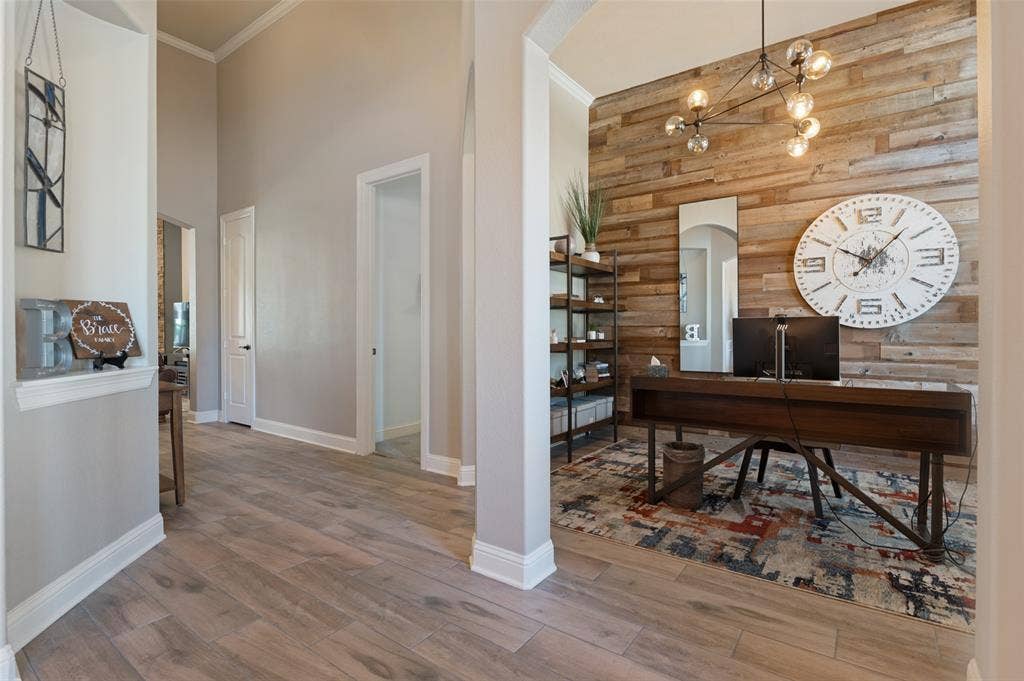 1504 Daisy Lane, Flower Mound, TX 75028 Wood-finish flooring throughout, with crown molding and high ceilings