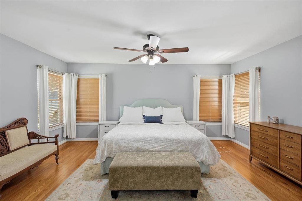3712 Brighton Road, Fort Worth, TX 76109 Spacious primary bedroom featuring Symmetrical corner windows provide generous natural light. The primary bedroom also features double closets.