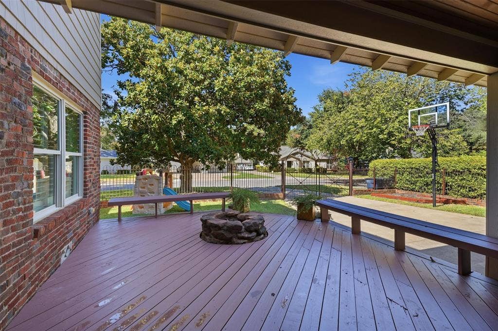 3712 Brighton Road, Fort Worth, TX 76109 Large backyard deck with a fireplace - perfect for hosting year round get togethers!