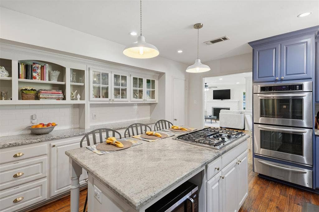 3712 Brighton Road, Fort Worth, TX 76109 Showcases custom white built-in hutch cabinets with glass front, and tons of storage throughout