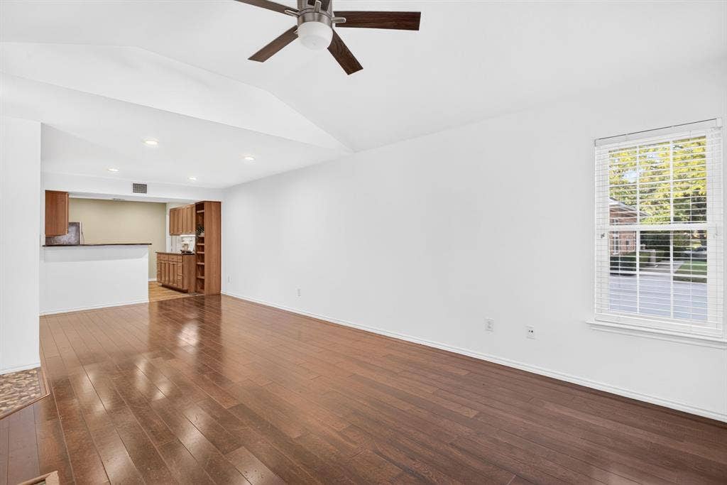 Open concept; you'd put your dining space just beyond the footprint of the living room leading to the kitchen.