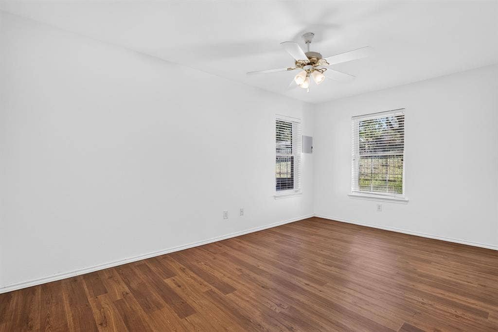 Guest bedroom across the hallway was used as an art studio - flooring is durable luxury vinyl plank.