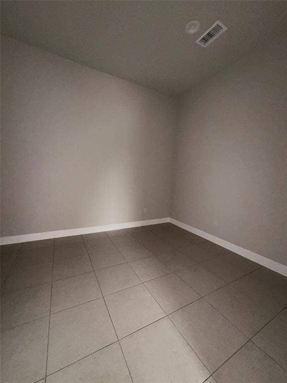 3721 S Stonebridge Drive, #704, McKinney, TX 75070 Tile flooring with neutral wall tones and recessed lighting