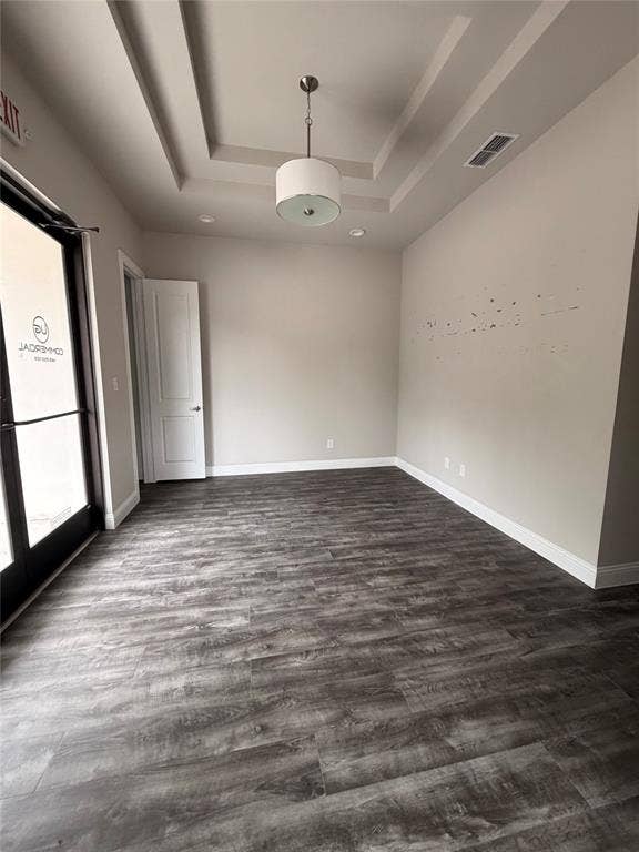 3721 S Stonebridge Drive, #704, McKinney, TX 75070 Tray ceiling with recessed lighting and a drum pendant fixture