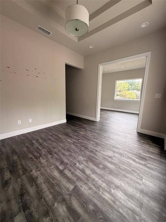 3721 S Stonebridge Drive, #704, McKinney, TX 75070 Recessed lighting, tray ceiling, wood-finish flooring, and a drum pendant light fixture