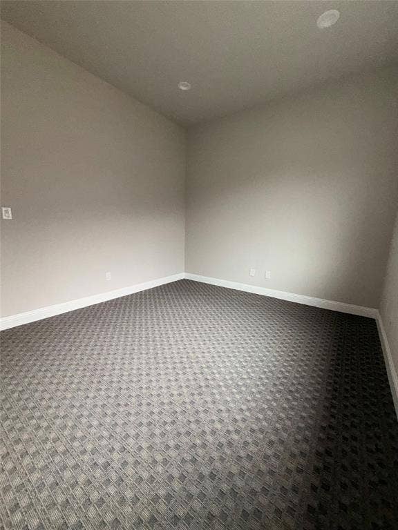 3721 S Stonebridge Drive, #704, McKinney, TX 75070 Recessed lighting, neutral wall tones, patterned carpeting, and white trim