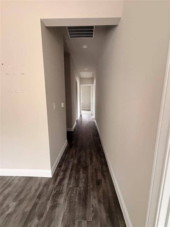 3721 S Stonebridge Drive, #704, McKinney, TX 75070 Hallway with wood-finish flooring, light-toned walls, recessed lighting, and white trim