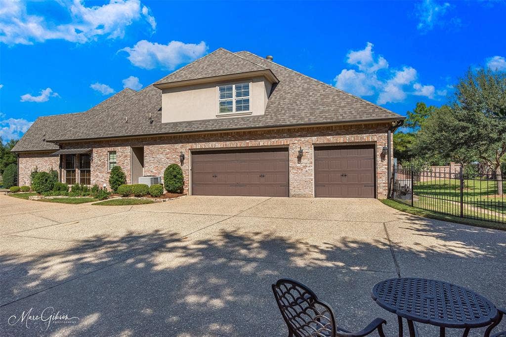 Extra Wide Driveway provides plenty of guest parking without blocking the driveway. The oversized three car garage provides space for large trucks.
