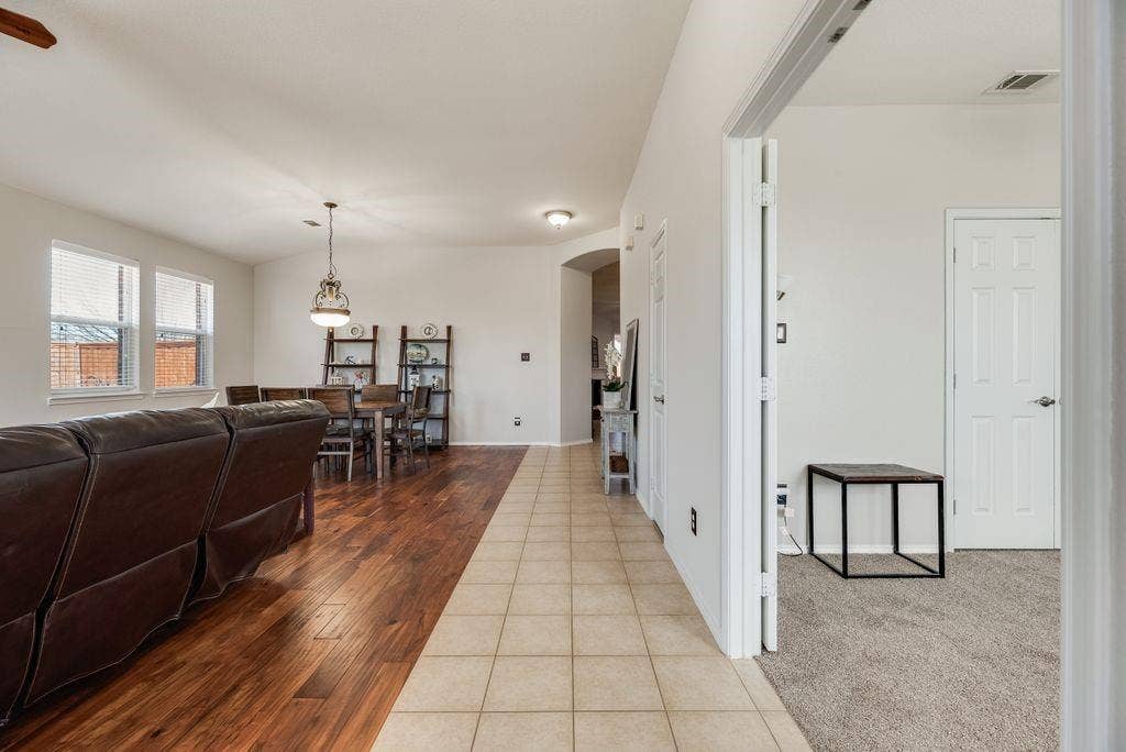1323 Canyon Creek Road, Wylie, TX 75098 Wood-finish flooring in main living area