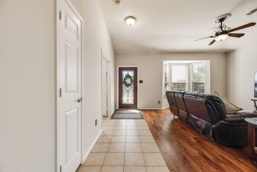 1323 Canyon Creek Road, Wylie, TX 75098 Recessed lighting, bay window, wood-finish flooring, tile flooring, ceiling fan