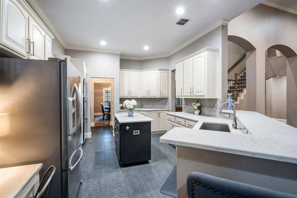 Kitchen with a prep island all updated in 2020- still very fresh looking
