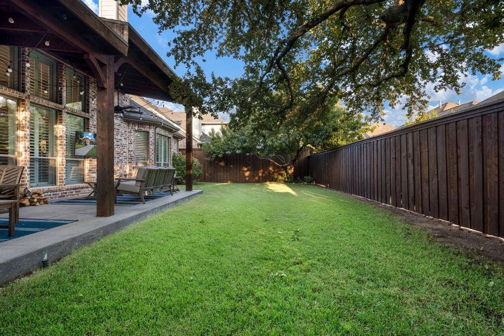 well maintained back yard with a wide lot