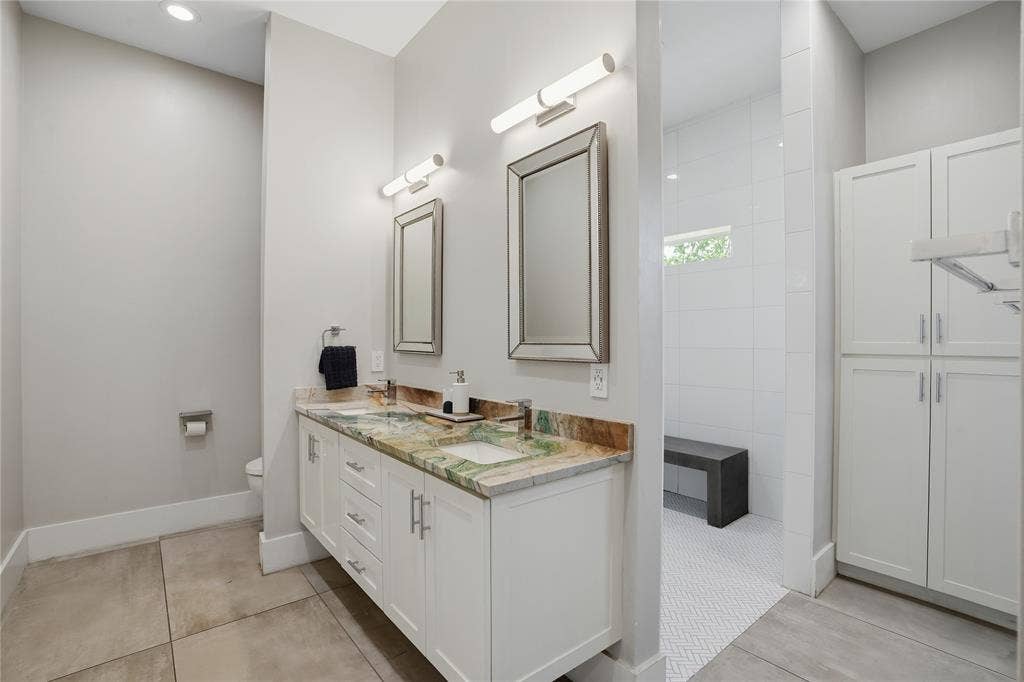 180 S Cisco Street, Dallas, TX 75246 Dual vanity with custom marble countertop