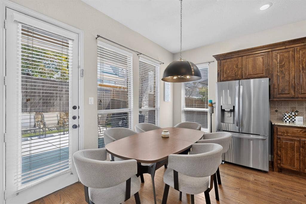 1494 Willingham Drive, Allen, TX 75013 Wood-finish flooring, recessed lighting, and a contemporary dome pendant light fixture