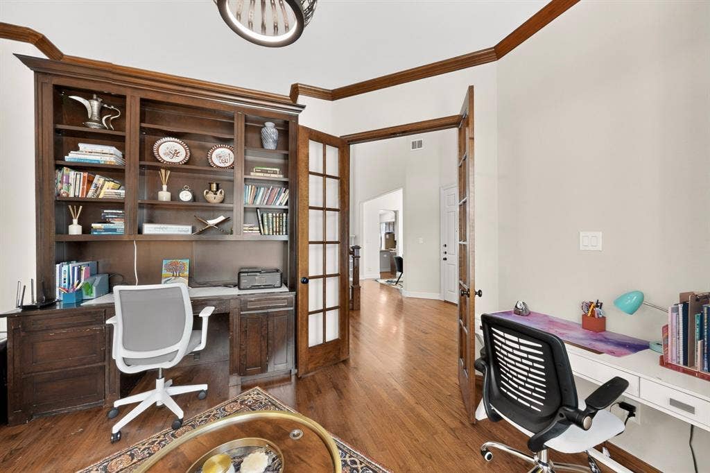 1494 Willingham Drive, Allen, TX 75013 Dedicated work area featuring rich wood-finish flooring, built-in shelving, and French doors
