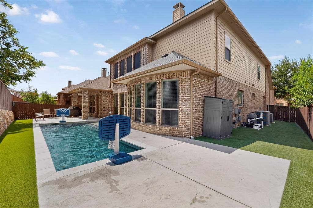 1494 Willingham Drive, Allen, TX 75013 Brick and siding exterior with multiple windows