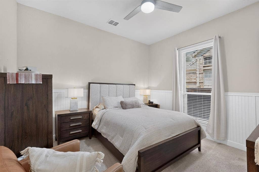 1494 Willingham Drive, Allen, TX 75013 Vaulted ceiling, ceiling fan, carpet flooring, window with blinds, and wainscoting
