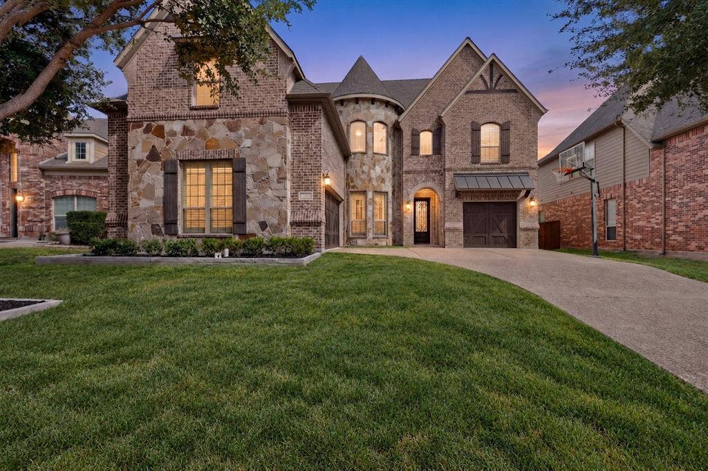1494 Willingham Drive, Allen, TX 75013 Brick and stone facade with a turret detail