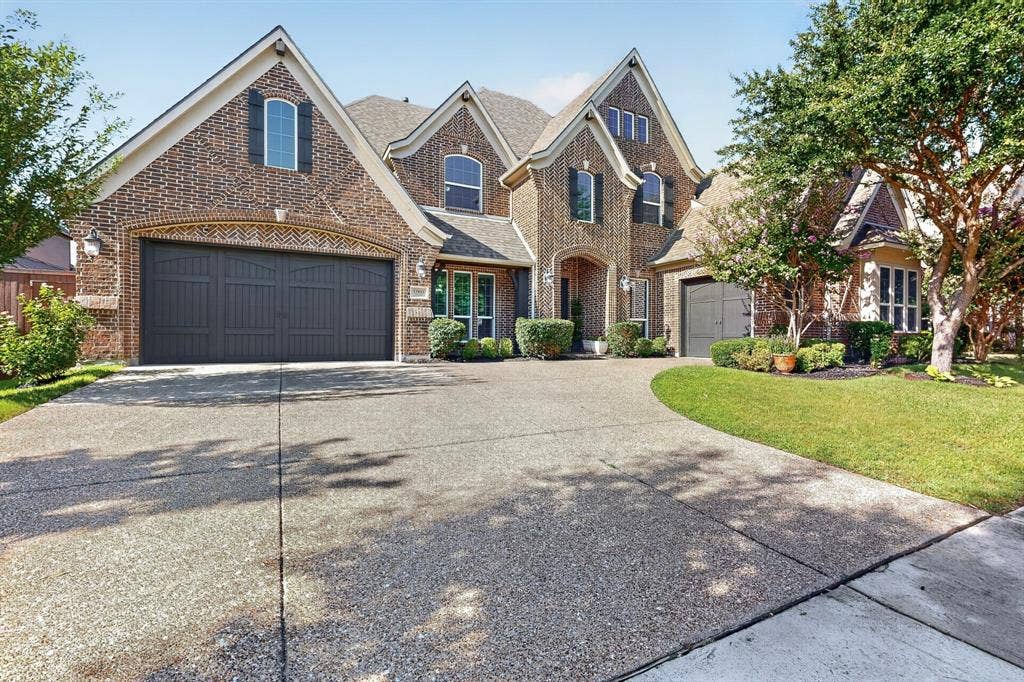 13853 Myatt Avenue, Frisco, TX 75035 Traditional brick exterior with gabled rooflines