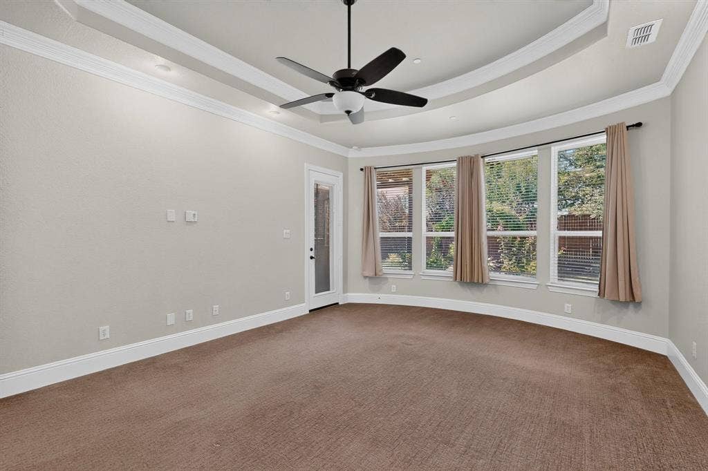 13853 Myatt Avenue, Frisco, TX 75035 Spacious room featuring a tray ceiling with recessed lighting, crown molding, and a ceiling fan