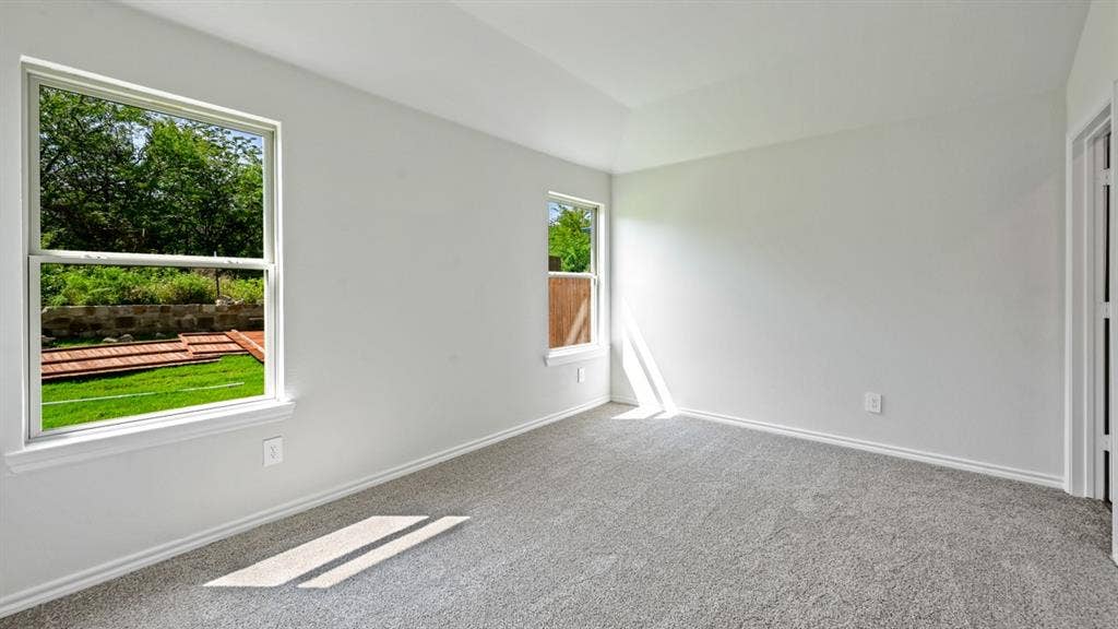 1667 Blaire Drive, Tyler, TX 75702 Neutral gray carpeting paired with light-toned walls