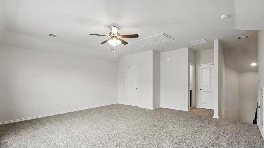 2510 Wesley Avenue, Royse City, TX 75189 Carpeted room with a ceiling fan, white walls, and multiple doors