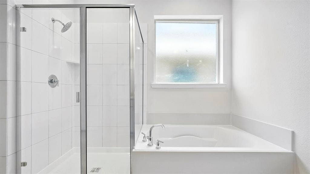 2503 Wesley Avenue, Royse City, TX 75189 Enclosed glass shower featuring subway tile surround and rain showerhead