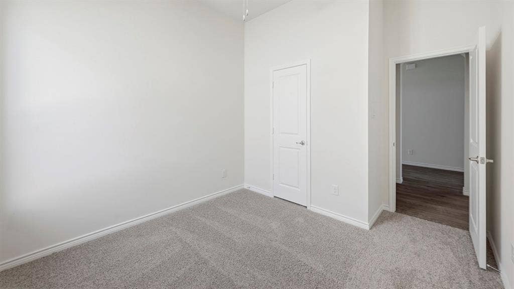 2506 Wesley Avenue, Royse City, TX 75189 Spacious interior room with light grey carpeting