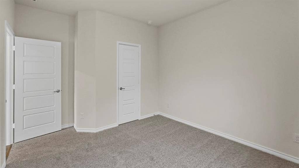 750 Hart Leaf Lane, Lavon, TX 75166 Light gray textured carpeting with white baseboards