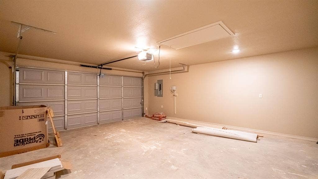 2714 Austin Drive, Granbury, TX 76048 Two car garage with garage door opener