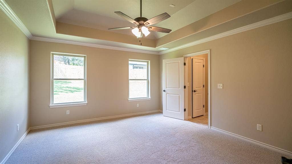 2714 Austin Drive, Granbury, TX 76048 Primary bedroom with ensuite bath and walk in closet
