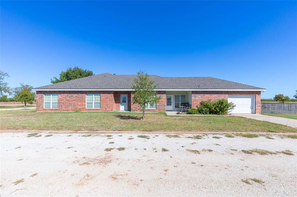 2313 Potosi Road, Abilene, TX 79602 Front door and garage for th eguest quarters.