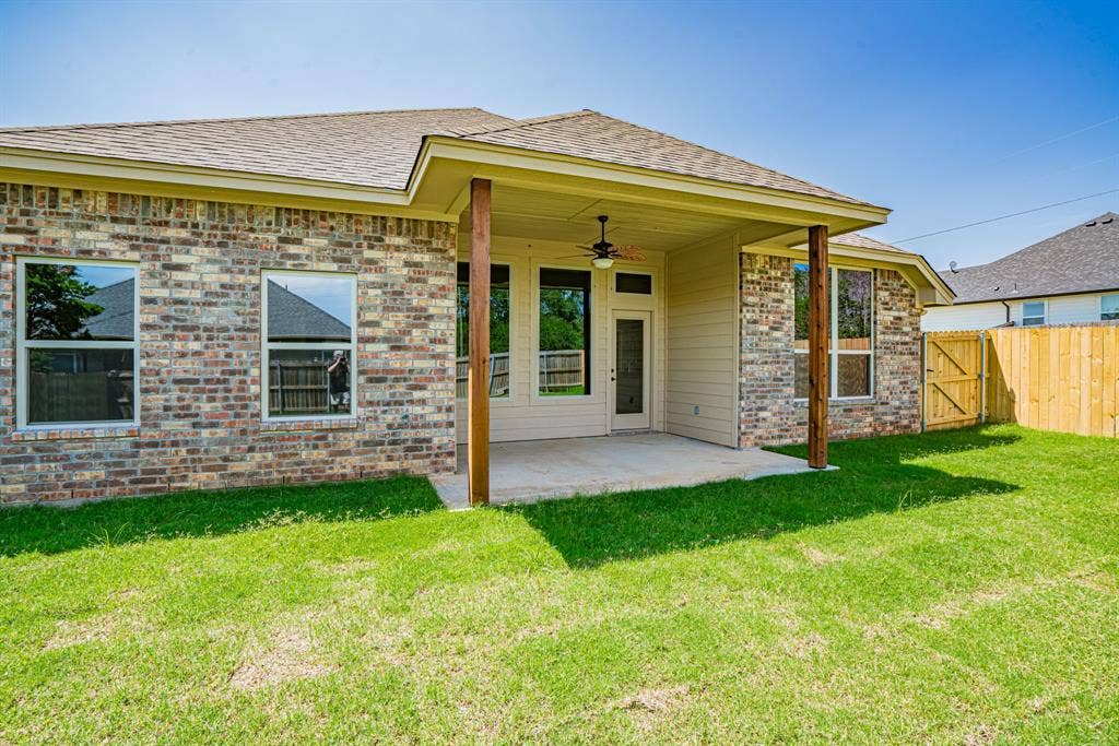 2600 Creek Drive, Granbury, TX 76048 Covered back porch in large yard