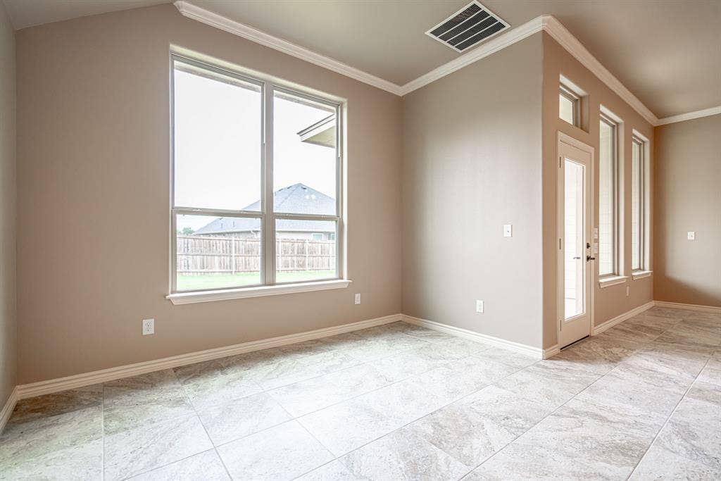 2600 Creek Drive, Granbury, TX 76048 Dining area with great back yard view.
