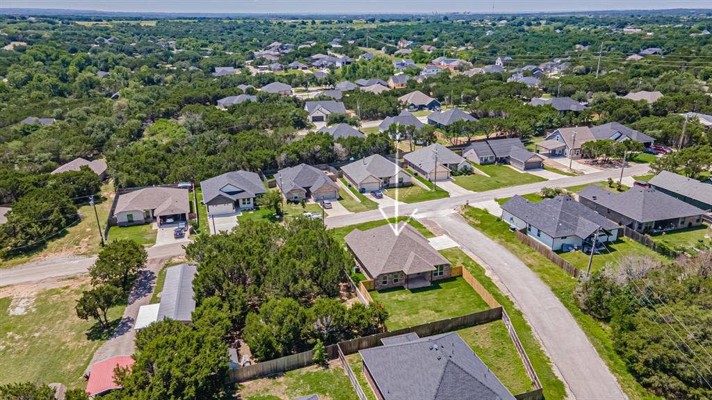 2600 Creek Drive, Granbury, TX 76048 Centrally located in Canyon Creek around nice newly built homes.