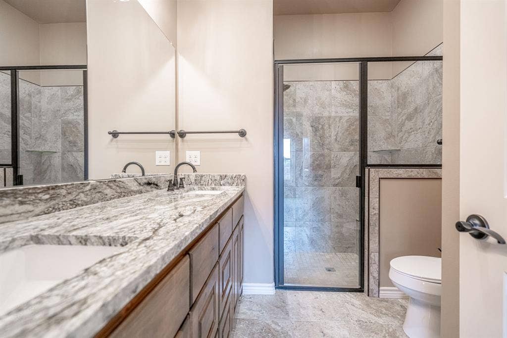 2600 Creek Drive, Granbury, TX 76048 Primary bath with large walk in shower