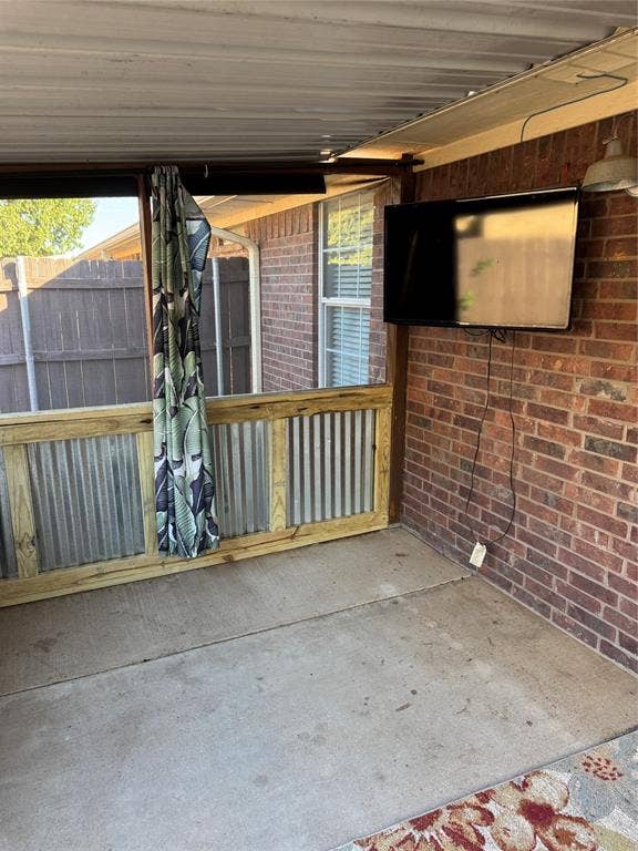 1006 Teresa Court, Granbury, TX 76048 screened porch with television for send living area