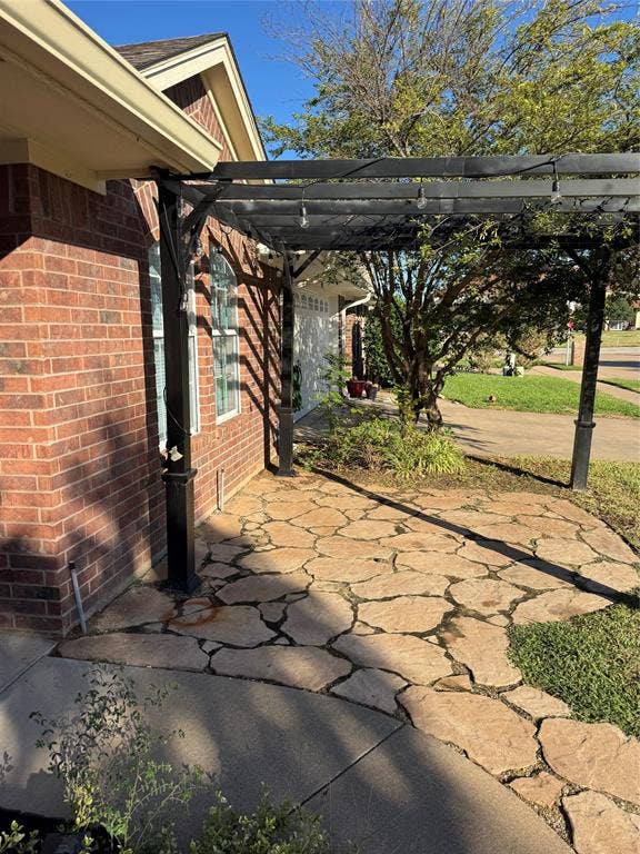 1006 Teresa Court, Granbury, TX 76048 pergola in the front yard