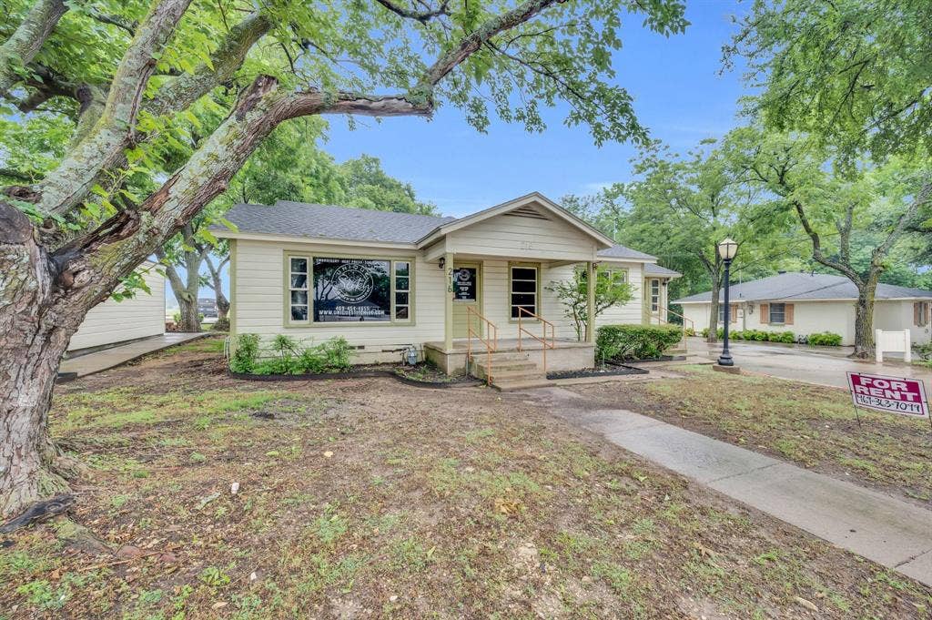 214 W Belt Line Road, #B, Cedar Hill, TX 75104 Single-story structure with light-colored siding, a covered porch entry, and a paved walkway