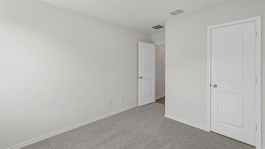 809 Brook Lane, Josephine, TX 75135 Textured gray carpet flooring