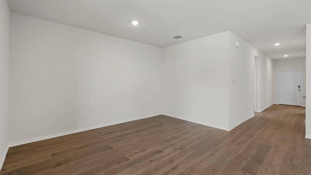 809 Brook Lane, Josephine, TX 75135 Recessed lighting, wood-finish flooring, and white walls throughout