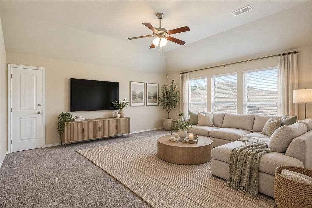 1300 Bellingham Circle, Glenn Heights, TX 75154 Virtually staged family room with a clean, bright, and inviting design that highlights the space’s open and comfortable feel.