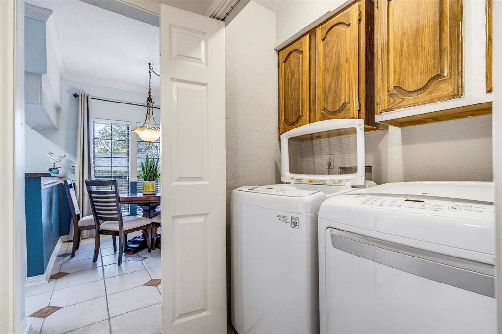 Great laundry area off the kitchen. Washer and dryer come with the condo....