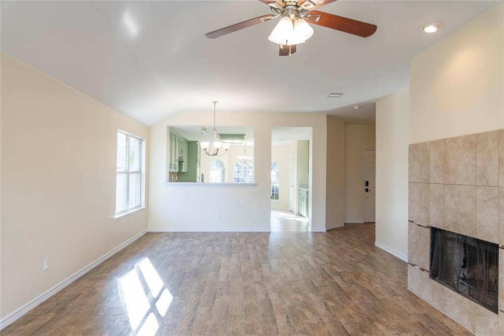 15534 Durango Drive, Frisco, TX 75035 Wood-finish flooring, recessed lighting, and a ceiling fan