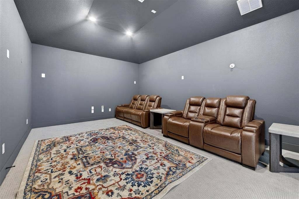 3312 Crosby Lane, Celina, TX 75009 Recessed lighting illuminating the ceiling, wall-mounted outlets, and light-colored carpeted flooring