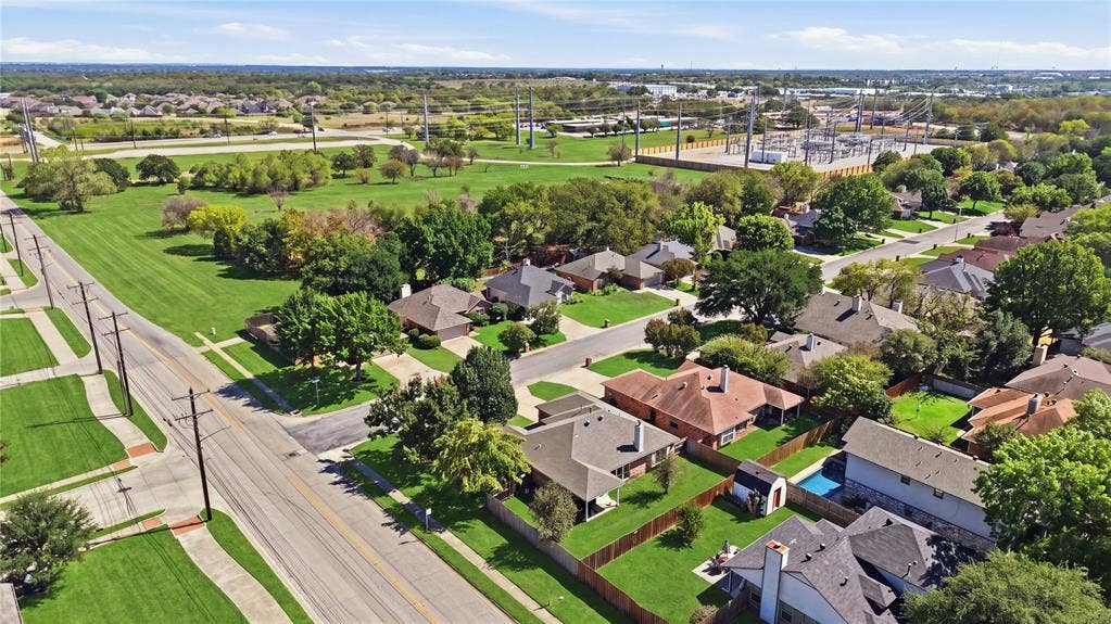 1125 Bayfield Drive, Denton, TX 76209 Residential neighborhood with mature trees, established roadways, and green spaces